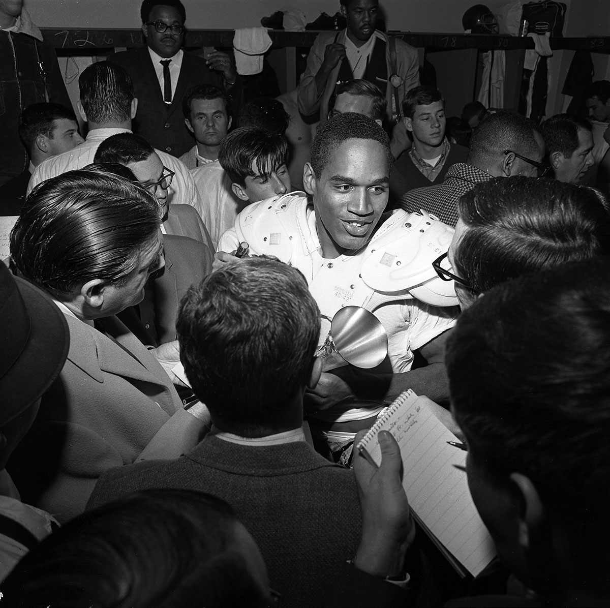 OJ Simpson talking to reporters in 1967. 